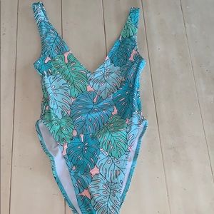 Kovey swim one piece never worn ! Great condition